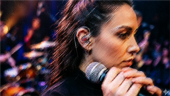Image of a musician holding a microphone